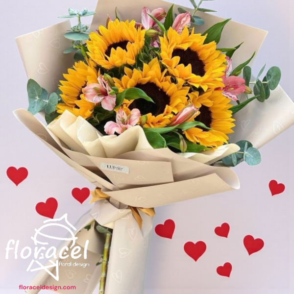 Ramo de girasoles y rosas rosas